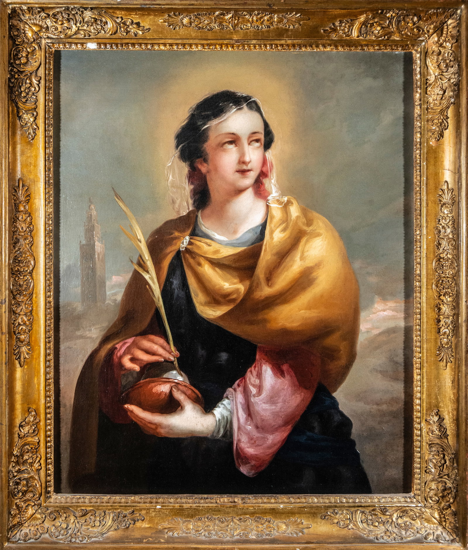 Santa Justa, Spanish school of Gutiérrez de la Vega, 19th century: Oil on canvas. Dimensions 77 x 59 / 90 x 74 cm. Half-length female figure identifiable as Saint Justa by the palm of martyrdom and the architecture in the background, probably an allusion to the Giral