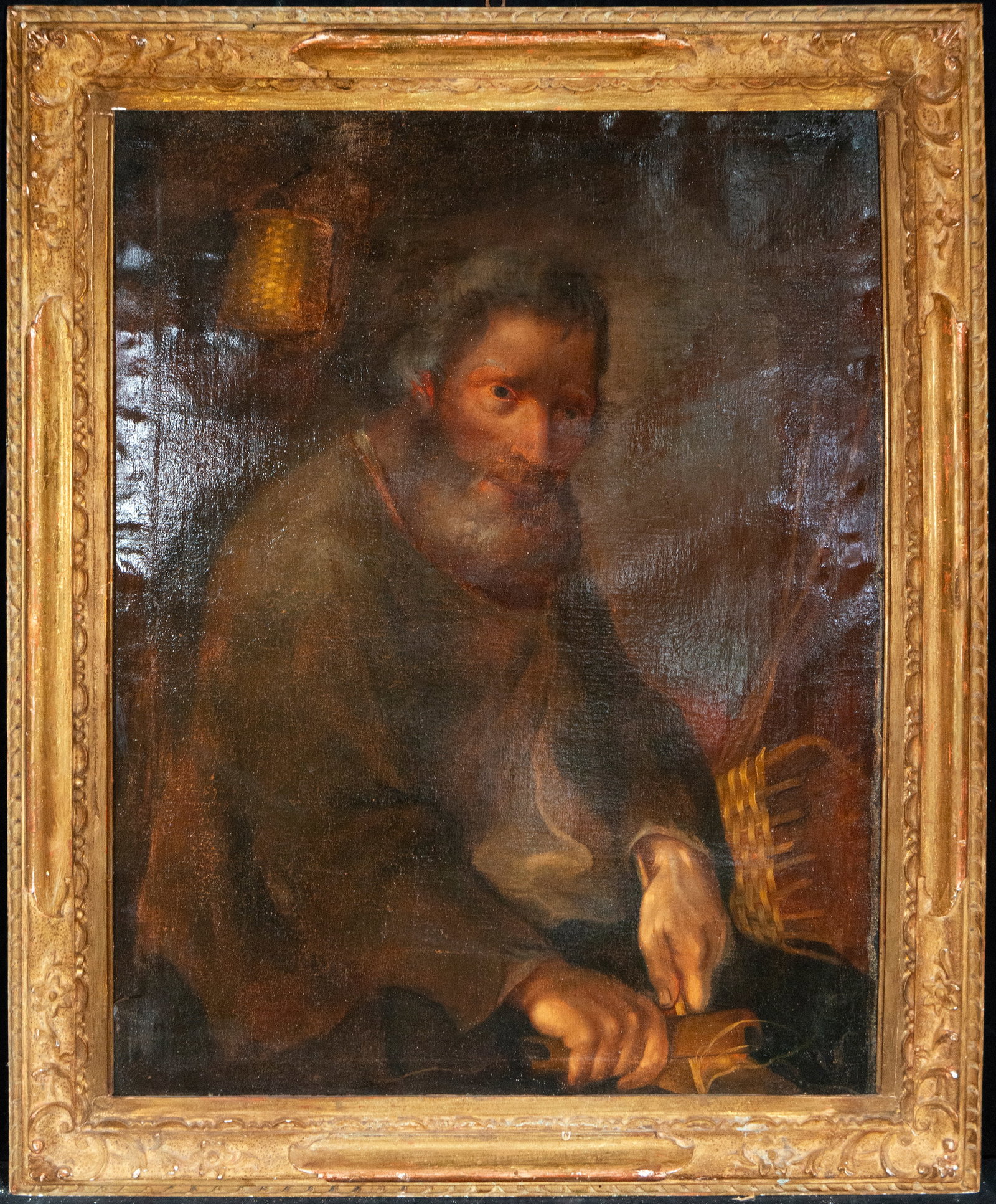 Portrait of an old man, 19th-century Dutch School: Oil on canvas. Dimensions 88 x 68 cm. Portrait of an elderly man with intense psychological expression, depicted in an interior setting and surrounded by artisanal tools. The fluid brushwork and intim