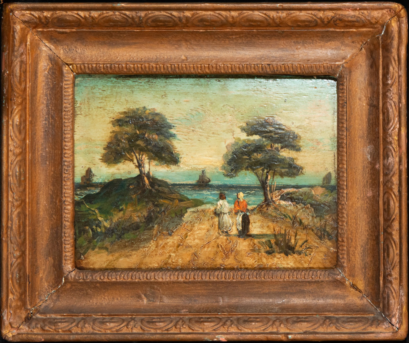 Coastal landscape with female figures. European Impressionist school. 19th century: Oil on panel. Dimensions 21 x 28 cm. A coastal scene enlivened by two female figures in the foreground, standing on a sandy path that visually leads to the sea. The composition is structured by the ar
