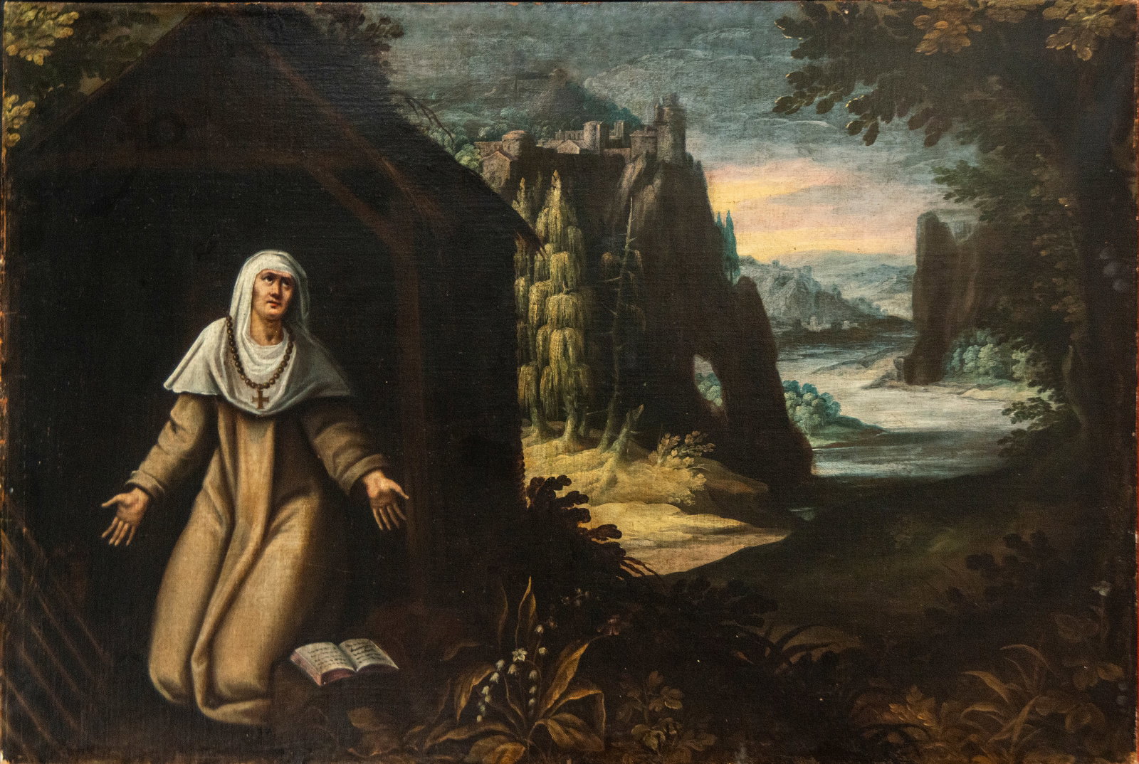 Saint praying in landscape, Spanish school, 17th century: Oil on canvas. Dimensions 145 x 97 cm. Figure of a saint kneeling at the door of a hermitage or cell, with a rosary and cross on her chest, presented in a broad landscape of mountains, a river, and di