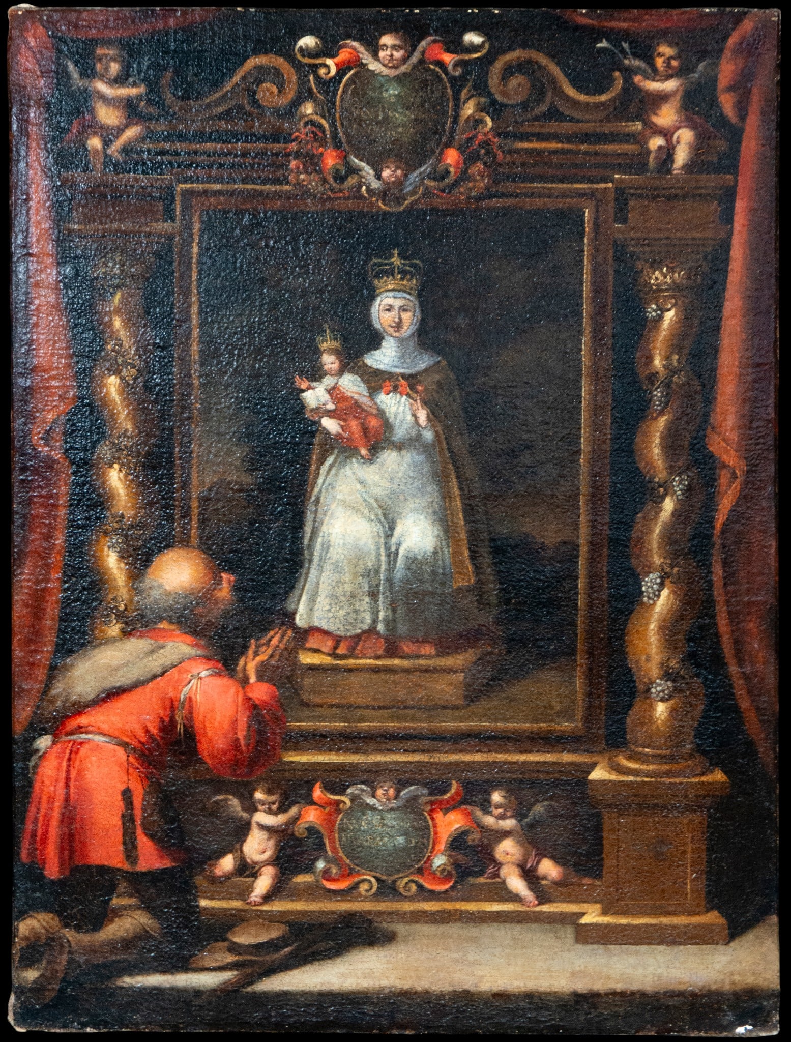 VIRGIN OF VALVANERA - Mexican Colonial School, 17th Century: Oil on canvas. Dimensions 65 x 47 cm. A devotional scene centered around a crowned image of the Virgin and Child, presented on a pedestal within an elaborate trompe-l'œil altarpiece. The painted arch