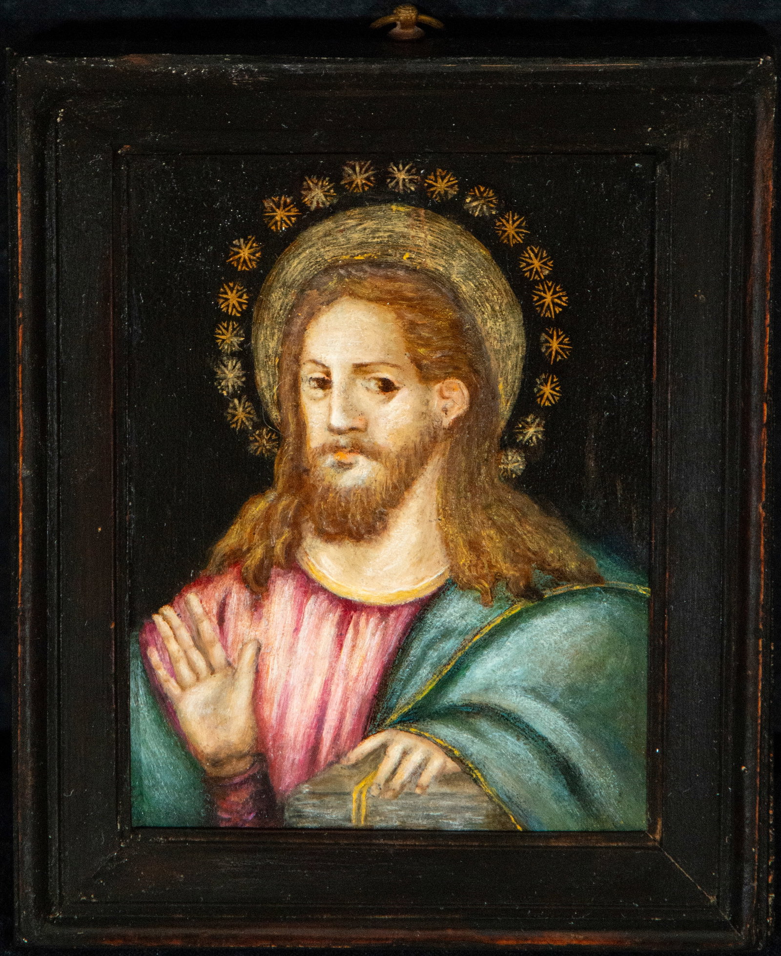 Salvator Mundi. Colonial School. 18th Century.: Oil on panel. Measures 35 × 28 cm. Christ blessing with his right hand and holding the globe in his left. His serene expression and long hair are framed by a Flemish-inspired golden halo of stars. Th