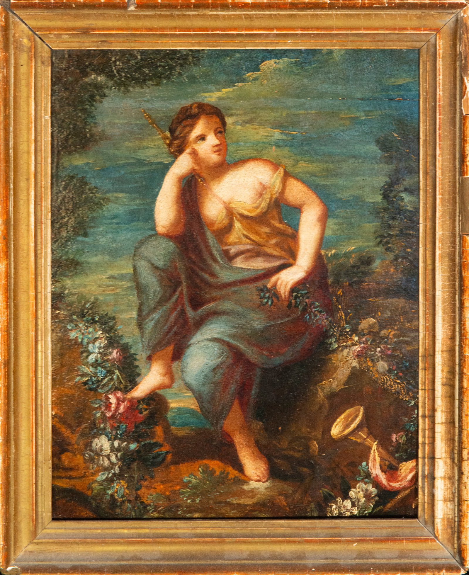 Flora, allegory of spring. Italian School. 18th century: Oil on panel. Dimensions: 36 x 28 cm (41.5 x 34 x 2.5 cm with frame). Depiction of Flora, goddess of flowers, seated among garlands in a luminous landscape. The loose brushstrokes and warm colors refl