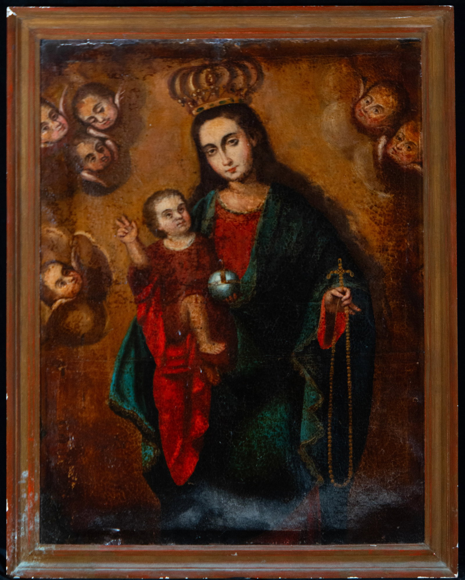 Virgin of the Rosary with Child and cherub heads, colonial school, 18th century: Oil on canvas. Measurements 85 cm x 63 cm. Measurements with frame 92 cm x 72 cm.