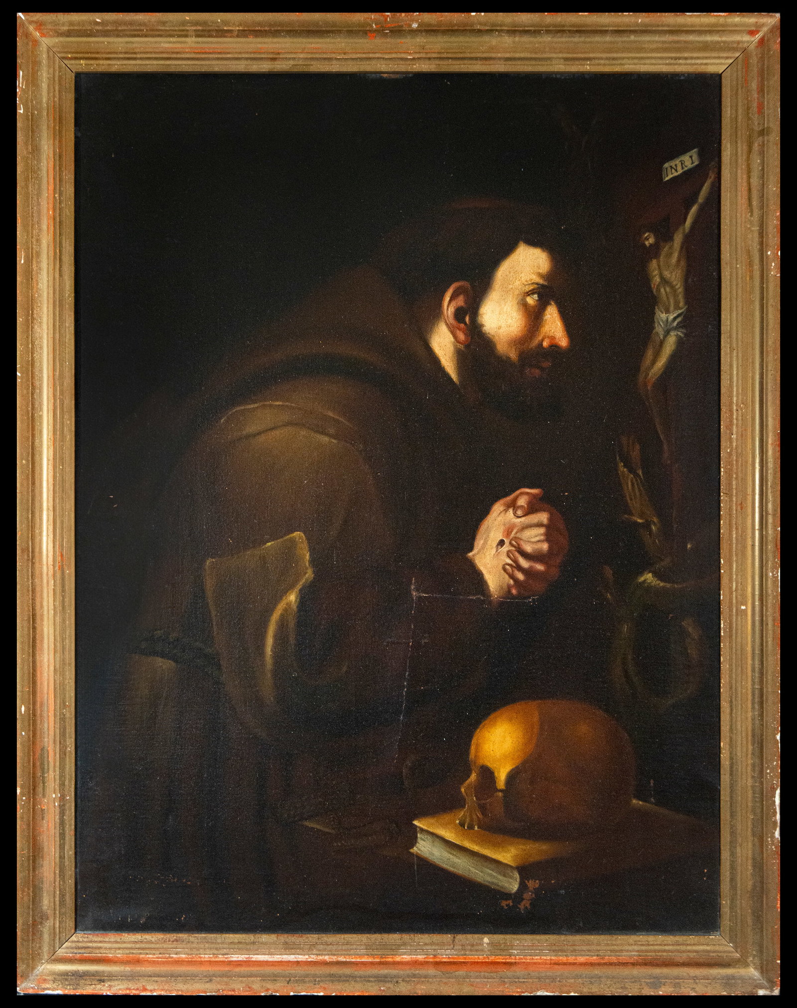 Portrait of Saint Francis in Prayer - 17th century Bologna, Italy: Oil on, measurements: 93 x 73 cm, total, with frame. An oil painting showing a friar in prayer, with a skull and a book as symbols of meditation on death and faith. The use of deep shadows and focused