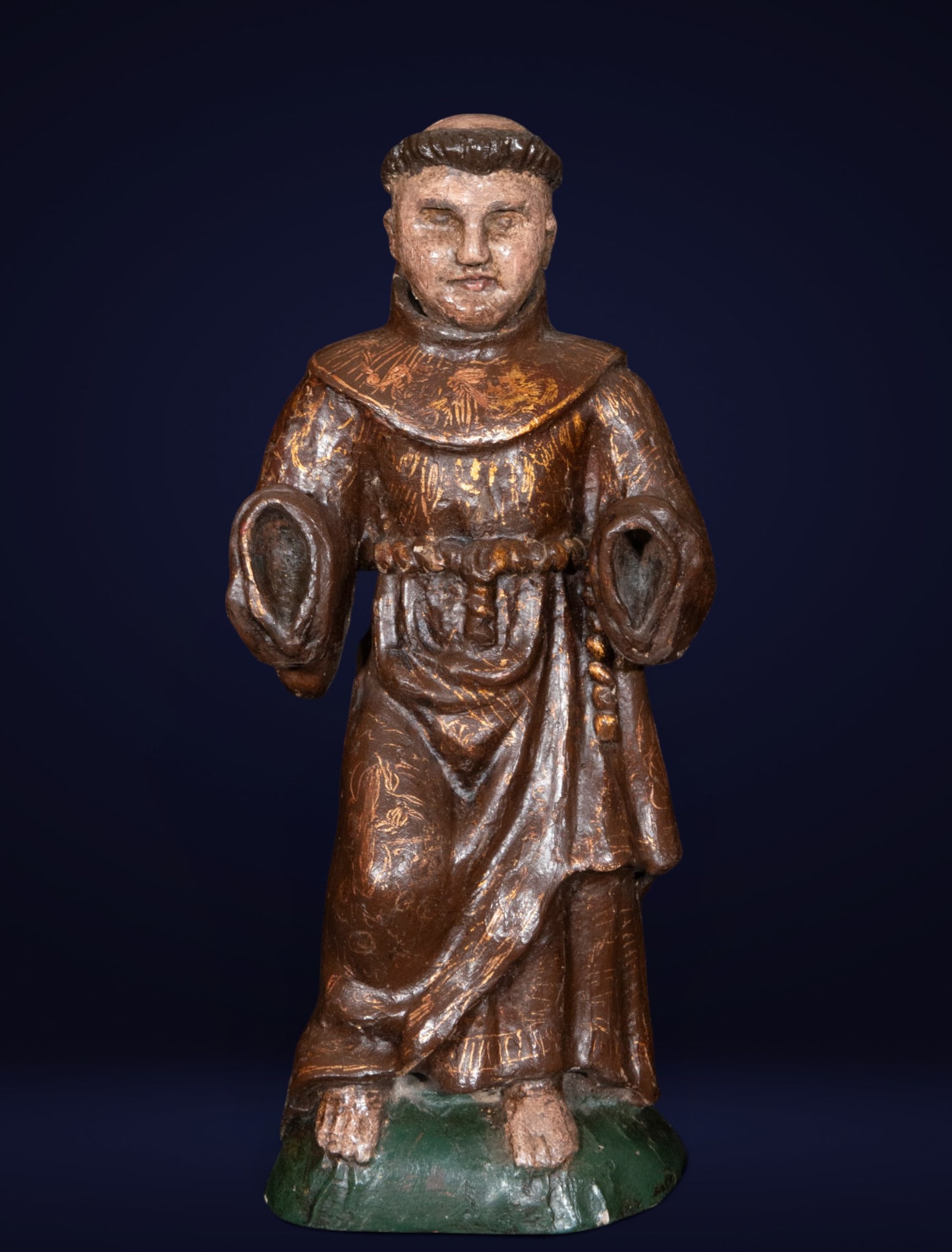 Saint Anthony of Padua, Spanish Baroque School, 18th Century: Polychrome and gilded wood carving. Measures 38 x 17 x 12 cm. Image of Saint Anthony of Padua depicted in Franciscan habit and frontal pose, intended for private devotion. The saint appears with the c