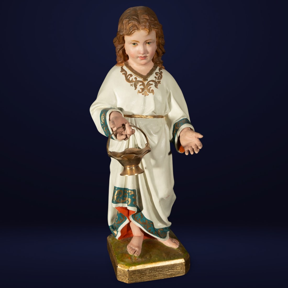 Wooden sculpture of a boy, early 20th century: Wood. Measurements: 43 cm x 16 cm x 15 cm