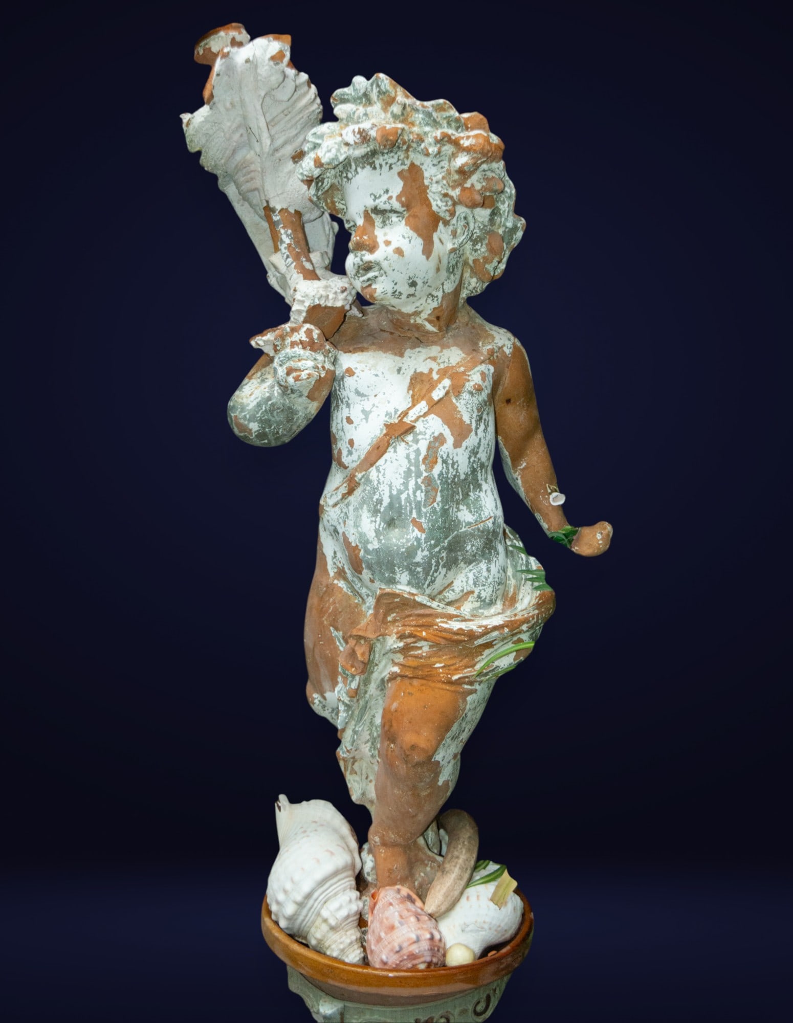 Outdoor child possibly made of resin with his base (1 of 5)