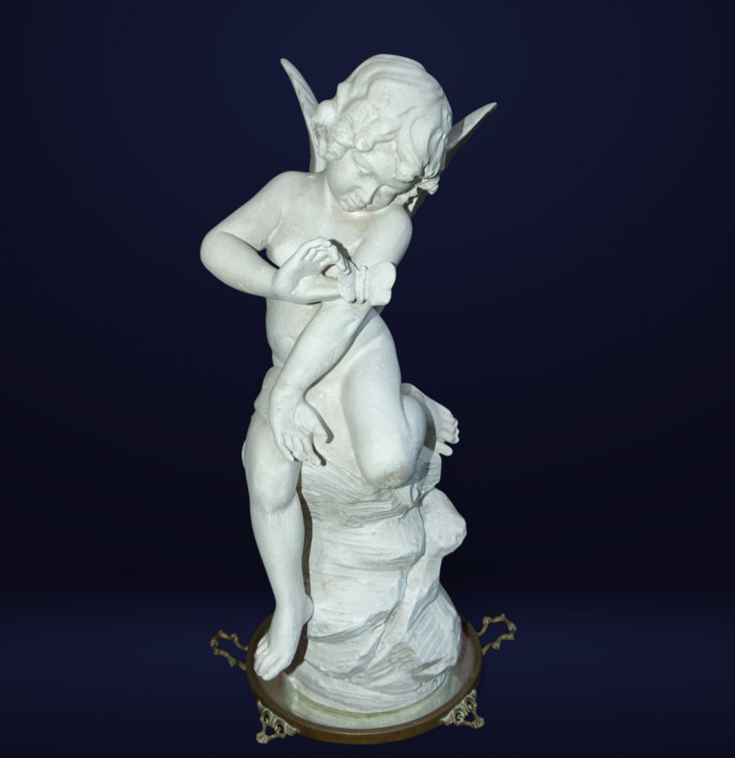 19th-20th century angel terracotta: Terracotta. Measurements: 50 cm x 24 cm x 24 cm