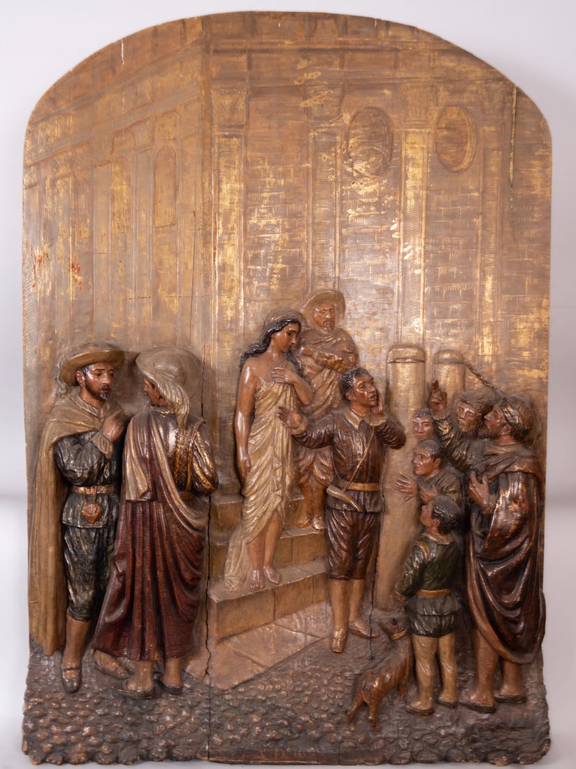 Polychrome wood relief depicting the sale of a slave at the doors of Seville Cathedral, 18th century: Below, the inscription Annus Domini 1690, with the polychromy restored in the 20th century. Dimensions: 127 x 91 x 13 cm