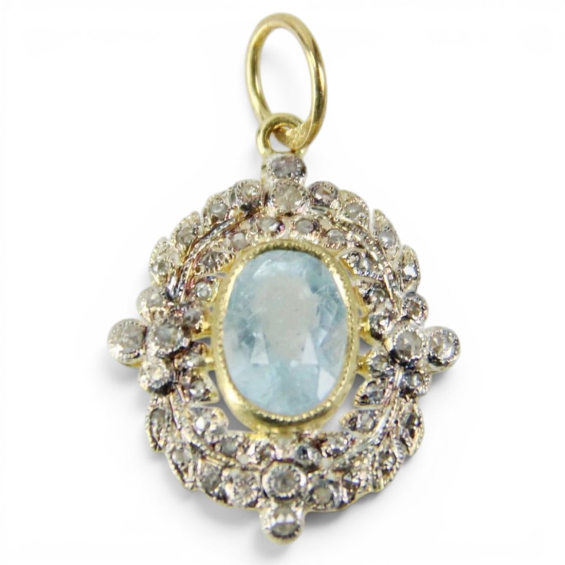 Pendant in silver gilt with aquamarine and rose cut diamonds: Partially gilded 925 sterling silver with a 14-karat gold bail, aquamarine, and rose-cut diamonds. This elegant pendant features an oval aquamarine of approximately 1.50 ct, surrounded by 48 rose-cut 