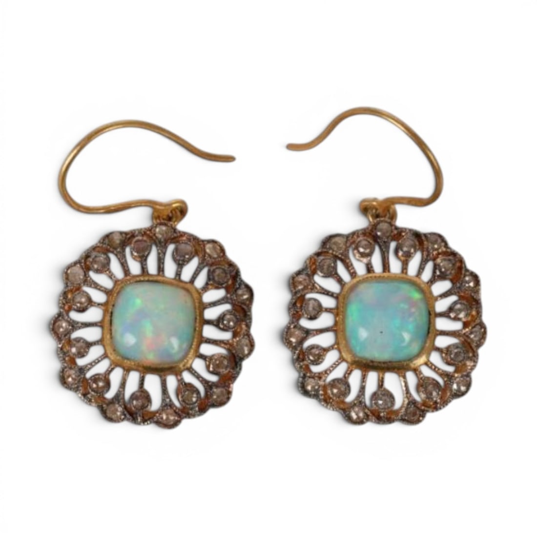 Pair of earrings in silver gilt with opals and rose cut diamonds: Partially gilded 925 sterling silver, opals, and rose-cut diamonds. A delicate pair of earrings crafted in partially gilded sterling silver, adorned with 44 rose-cut diamonds weighing approximately 0.