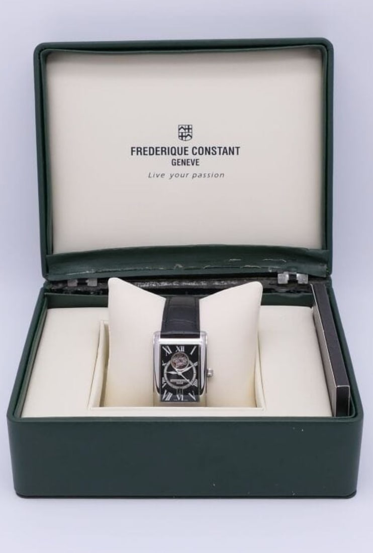 Frederique Constant Carree Heart Beat Date: Men's stainless steel wristwatch, rectangular case, black herringbone guilloché dial with Roman numerals for the hours and a date window at six o'clock. Embossed black leather strap. Automatic moveme