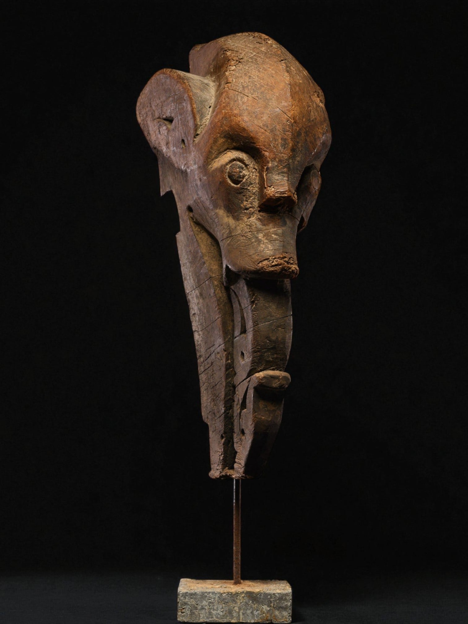 Architectural ornament (Singa), Toba Batak village, Sumatra, Indonesia, 20th century: Carved wood. MEASURES: 32 × 22 × 60 cm. Traditional architectural sculpture known as a Singa, used by the Toba Batak people of Sumatra as a protective element on the facades of communal houses (ruma