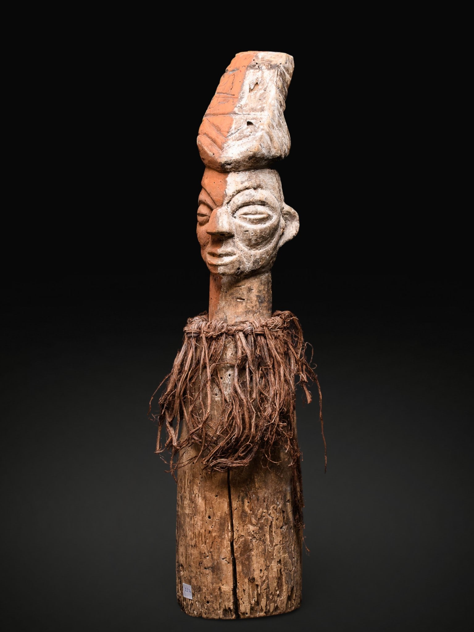 Yaka pillar-statue. Yaka people, Central Africa: Wood. Dimensions: 67 × 17 cm. Vertical wood carving belonging to the artistic tradition of the Yaka people, characterized by its elongated form and symbolic function. These figures were used as prote