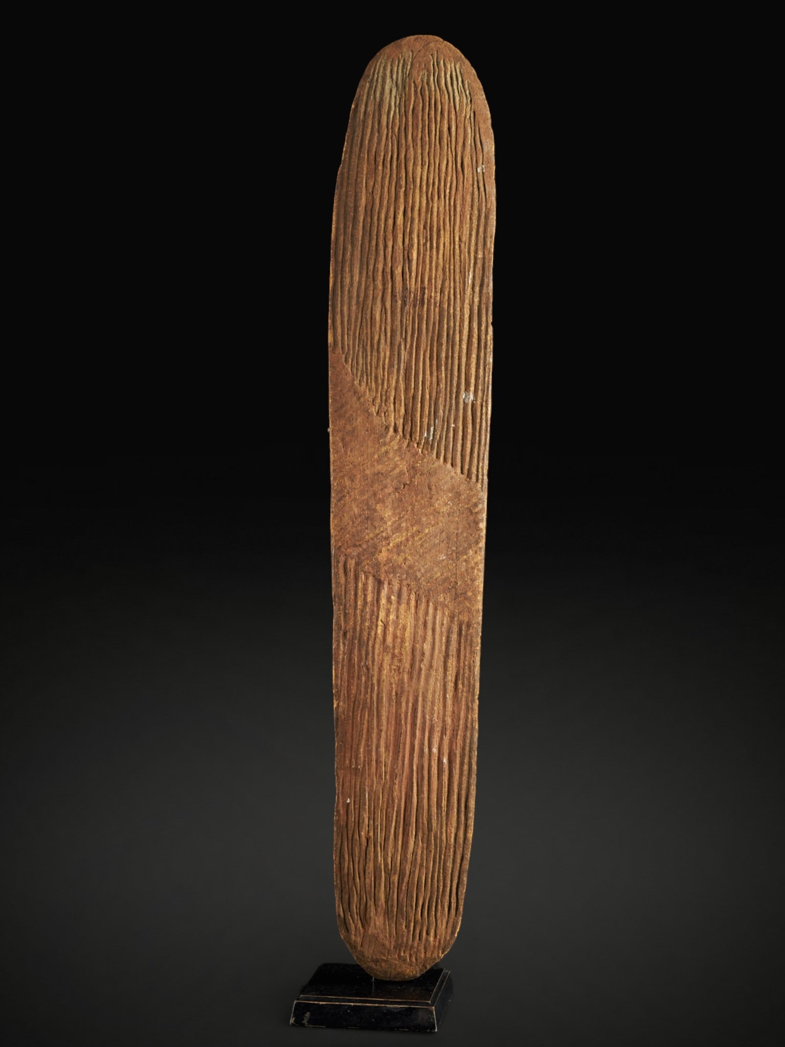 Wunda shield. Aboriginal people, Australia, 19th–20th century: Wood. Dimensions: 75 × 7.5 cm. Traditional Australian Wunda-type shield, carved from a single piece of wood and decorated with geometric zigzag incisions, with traces of red pigmentation on the rever