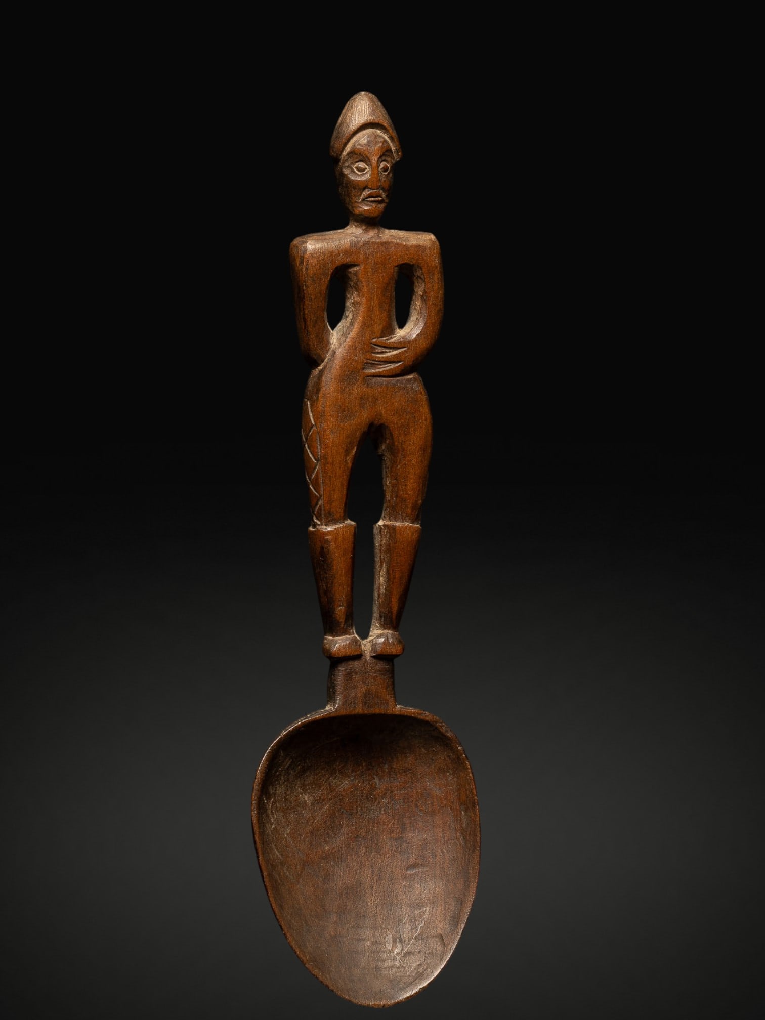Mexican spoon. Mexico, 20th century: Wood. Dimensions: 20 × 3.5 cm. Small carved wooden spoon, representative of traditional Mexican craftsmanship. This type of object combined functional use with decorative or symbolic value and could 