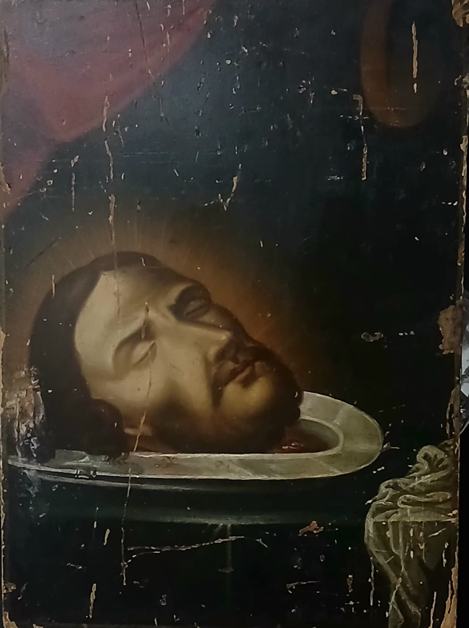 RUSSIAN SCHOOL (Russia, 18th century) - The head of Saint John the Baptist: Oil on panel. Dimensions: 36 × 24 cm. The work depicts the head of Saint John the Baptist, one of the most intense and devotional themes in Eastern and Western Christian iconography. The image allude