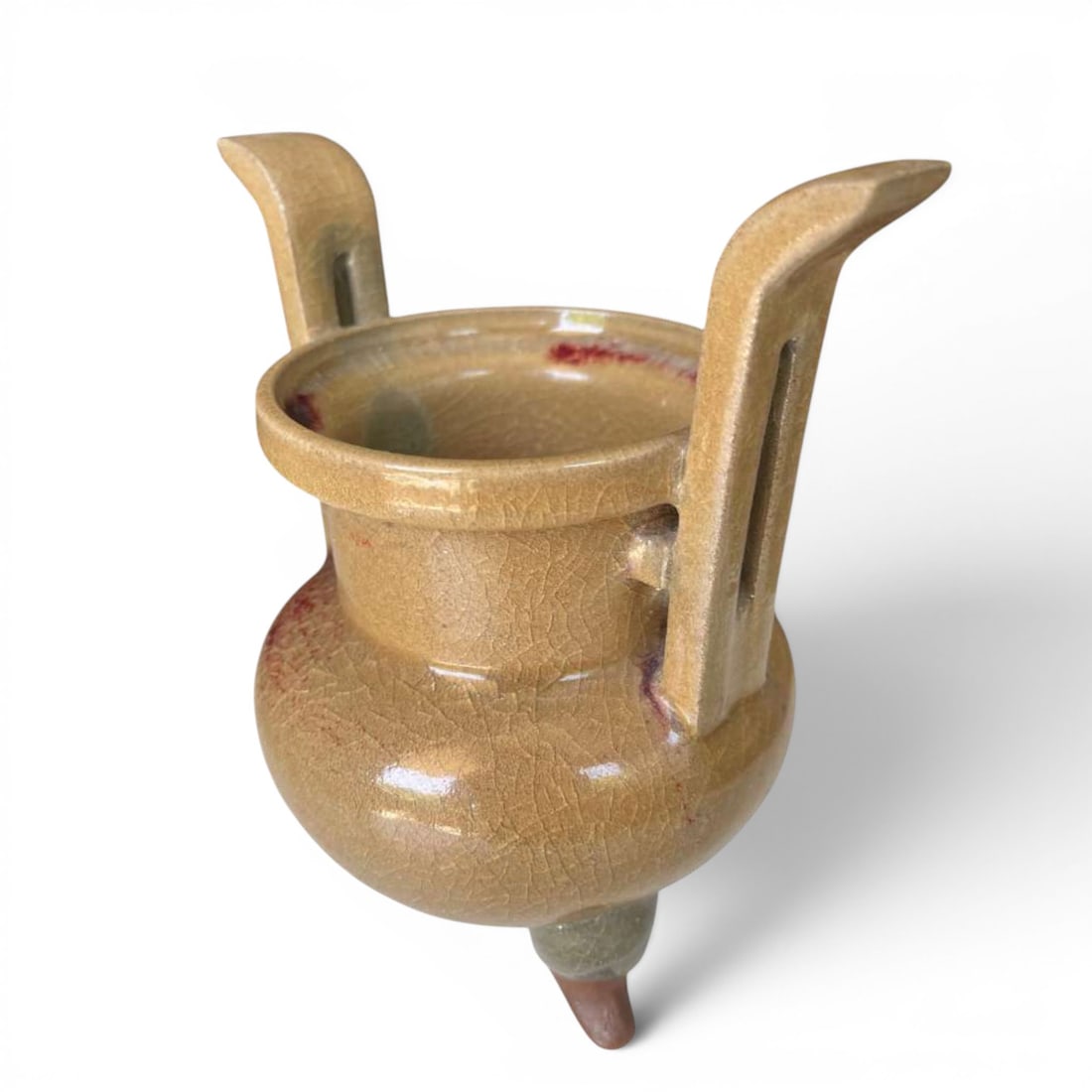 Chongtianer-type incense burner in celadon, Longquan, China, Song-Yuan dynasty: Longquan celadon glazed ceramic. Dimensions: height: 19.5 cm. Exceptional Chongtianer-type incense burner, made in the renowned Longquan kilns during the Song or Yuan dynasties. It features a globular