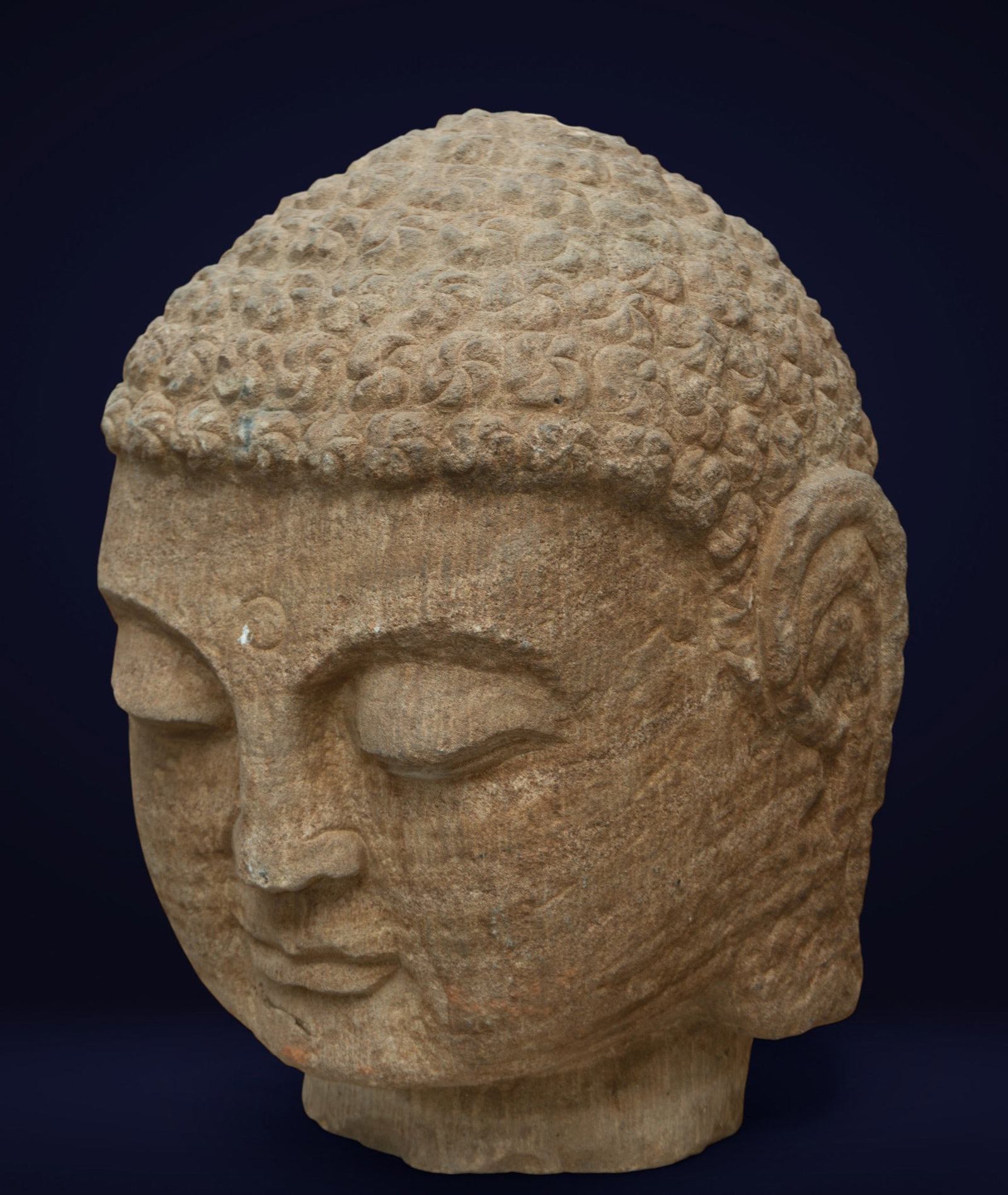 Buddha head carved in stone. Asian production. 20th century. (1 of 4)