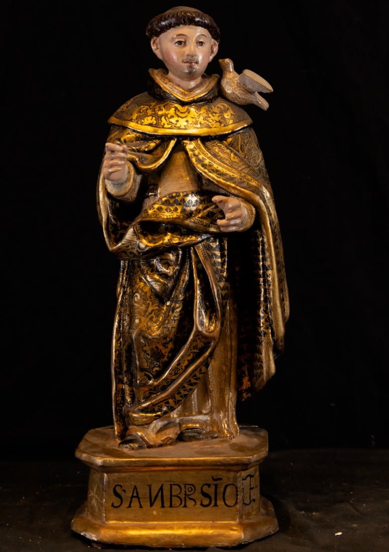 Saint Ambrose, Spanish Colonial School of Guatemala, 17th Century: Carved, gilded and polychrome wood. Measurements: 53 x 23 x 15 cm.