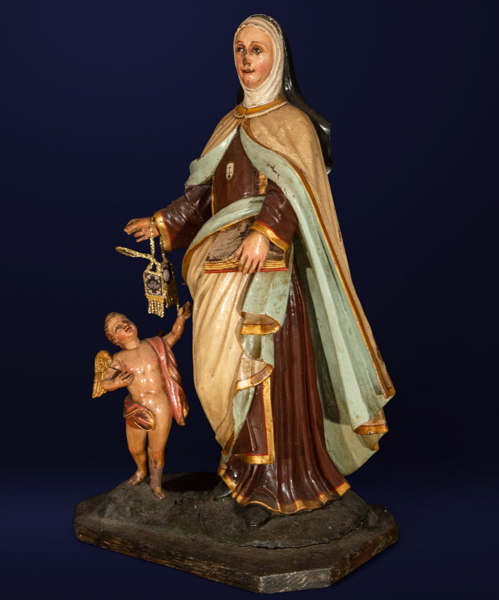 Colonial School of Quito, wood carving of Saint Teresa of Jesus from the late 18th century: Wood. Measurements: 58 cm x 34 cm x 25 cm