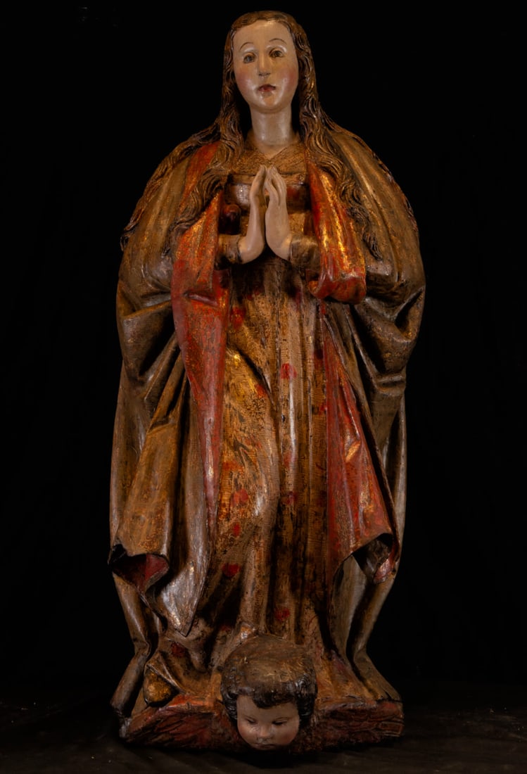 Large sculpture of the Immaculate Conception on the head of a cupid, 16th - 17th centuries: Wood carving. Dimensions: 93 x 40 x 22 cm.