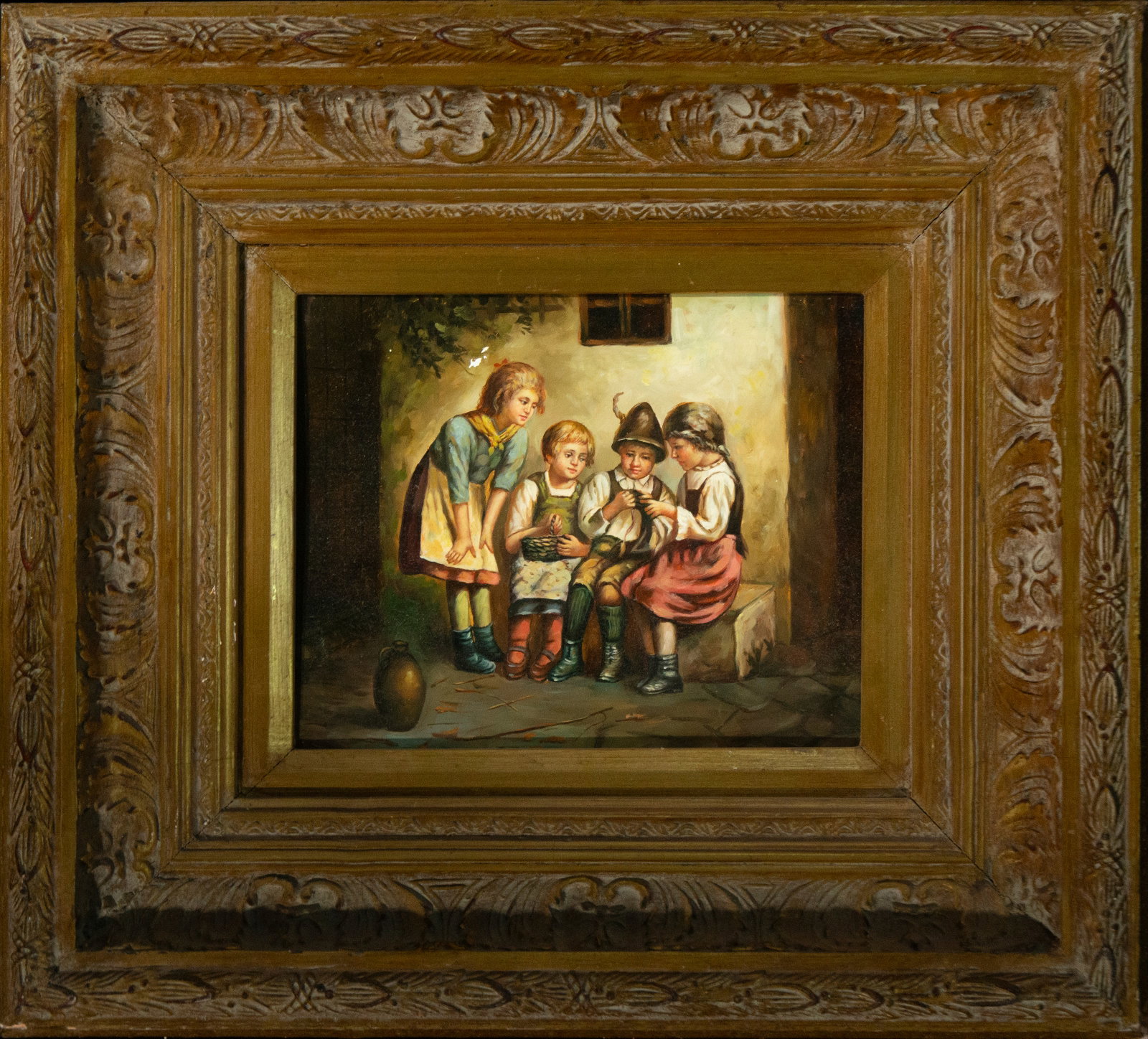 Oil on panel “Children’s Scene??, European School, 19th Century: Oil on panel. Dimensions: 24 x 21 cm; 49 x 44 cm. A genre scene depicting children in a domestic interior shows four children, dressed in traditional peasant clothing, gathered around a small object, 
