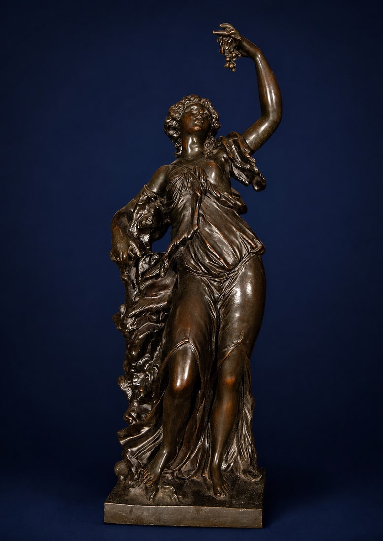 Goddess of the Harvest Ceres in bronze, French School, 19th Century: Patinated cast bronze. Dimensions: 50 x 20 x 12 cm. Allegorical female sculpture linked to the theme of the grape harvest, depicted in a dynamic pose with her torso partially covered by flowing draper