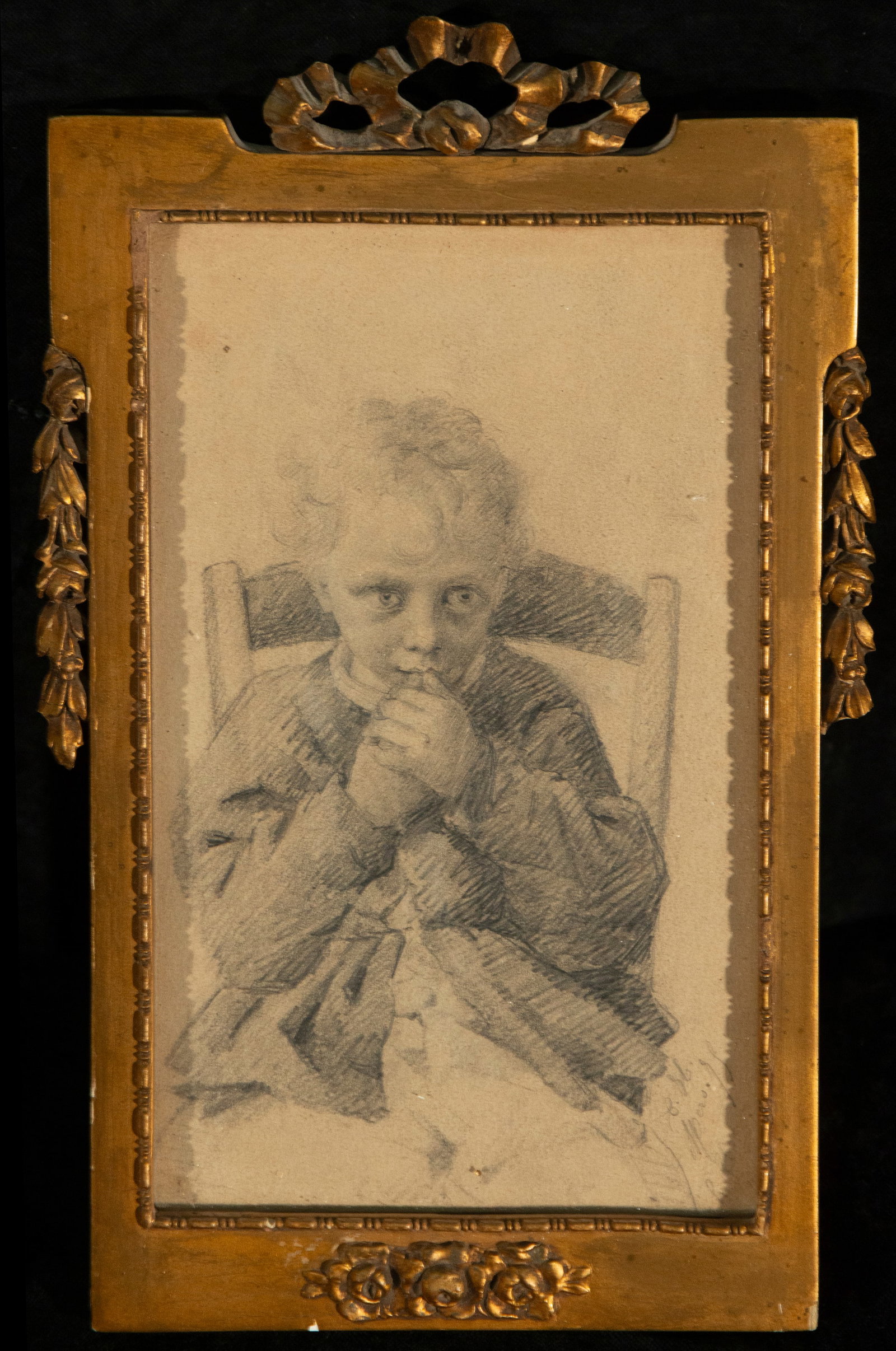 Child's drawing, Signed, Spanish School, 19th Century: Graphite on paper. Dimensions: 21 x 13 cm; framed 27 x 17 cm. An intimate childhood scene depicting a boy seated facing forward, resting a hand to his mouth in a pensive pose. The figure wears period 
