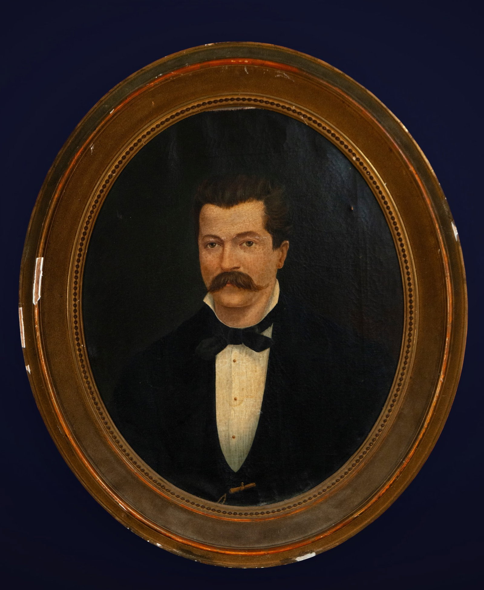 Portrait of a gentleman with a mustache, European School, 19th Century: Oil on canvas. Elegant half-length portrait of a man dressed in formal black attire, white shirt, and bow tie, reflecting the sobriety and bourgeois distinction of the 19th century. The face, carefull