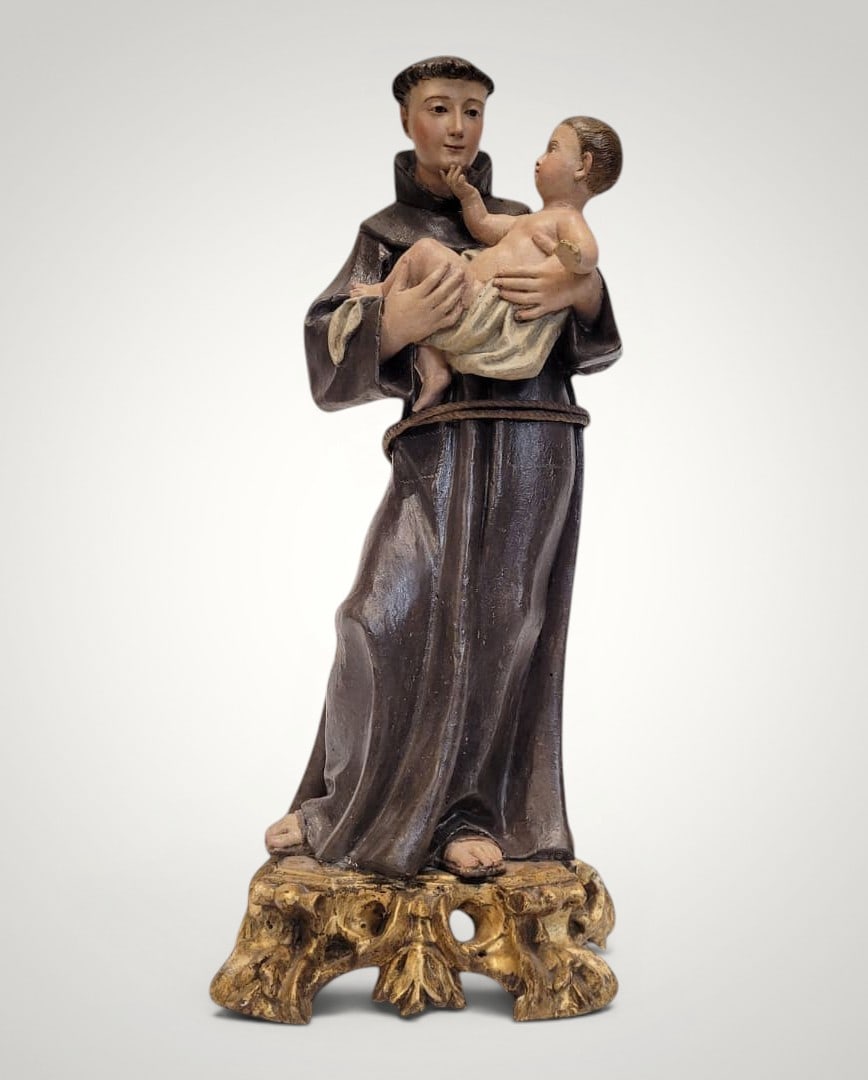 Italian Neapolitan Baroque carving of Saint Anthony with Child Jesus, 18th century, Naples: Technique on support: Wood carving. School: Italian School. Period: Late 18th century. Country of origin: Spain. Good condition considering its age and use / Minor damage to the Child's fingers. Dimen