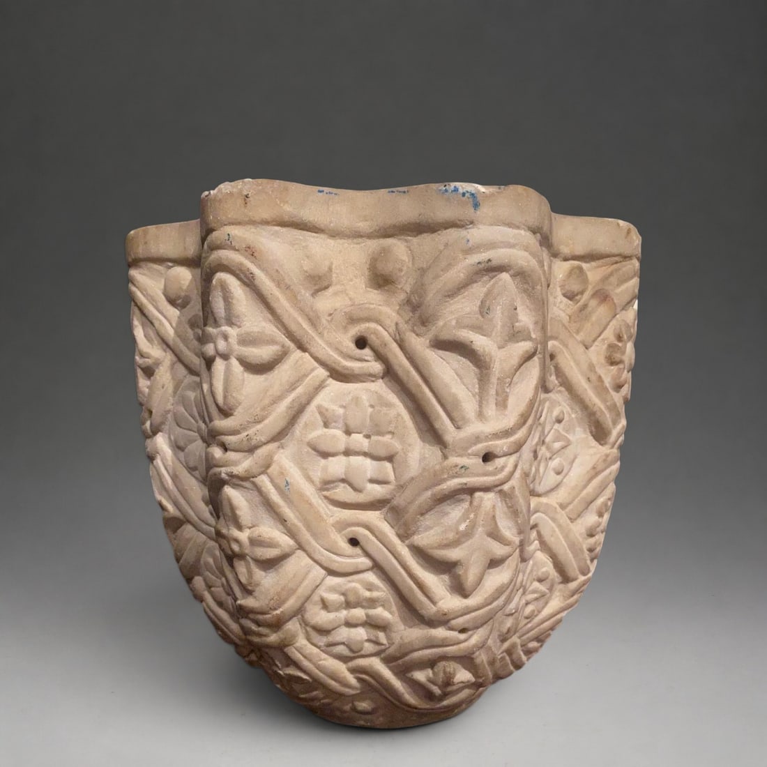 Romanesque holy water font with vegetal scroll decoration, France, 12th-13th century (1 of 1)