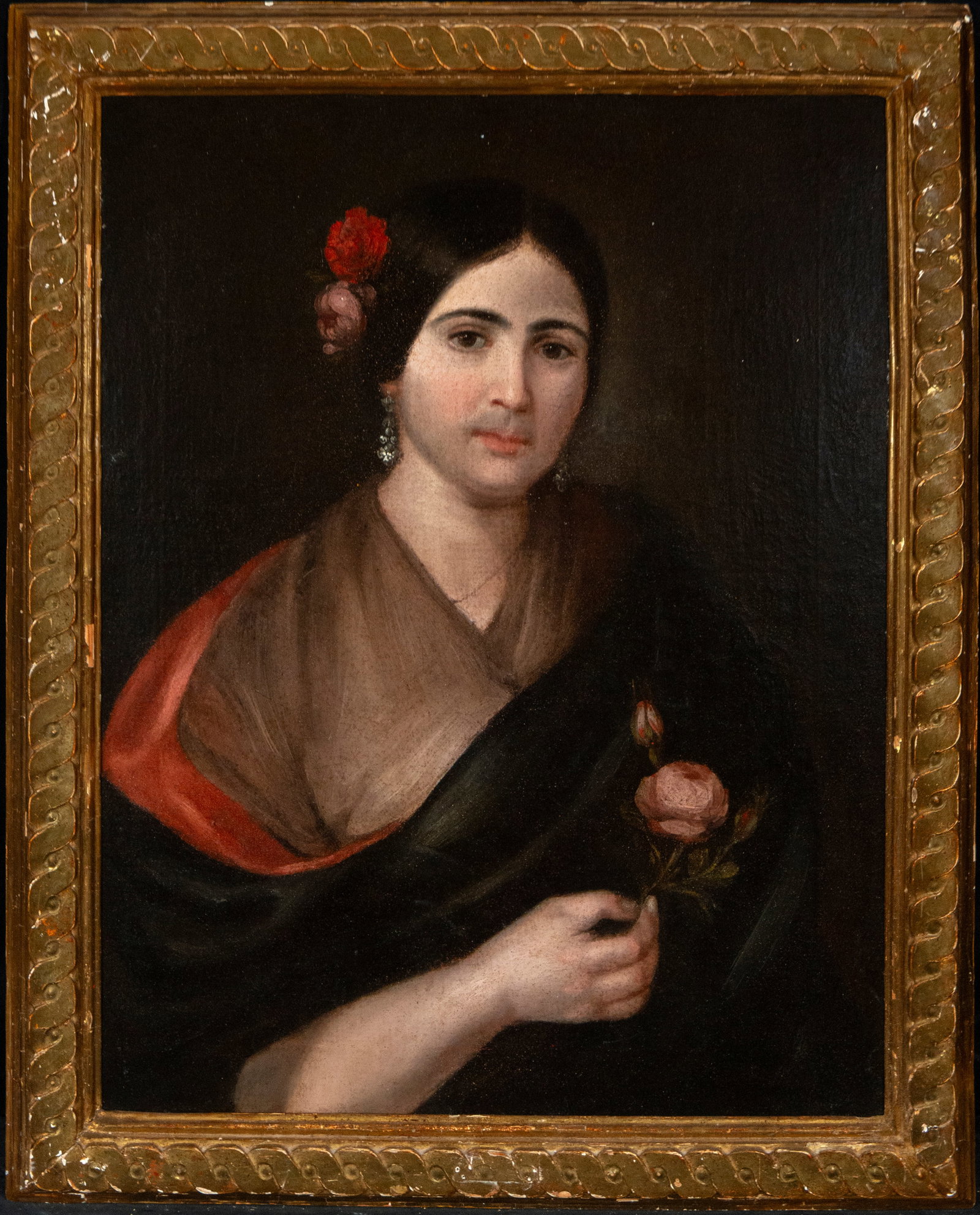 Portrait of a lady. School of Antonio Carnicero. Madrid School. 18th century: Oil on canvas. Dimensions without frame: 67 x 53 cm. Dimensions with frame: 77 x 64 cm. Half-length portrait of a woman holding a carnation, wearing elegant clothing and delicate adornments. The compo