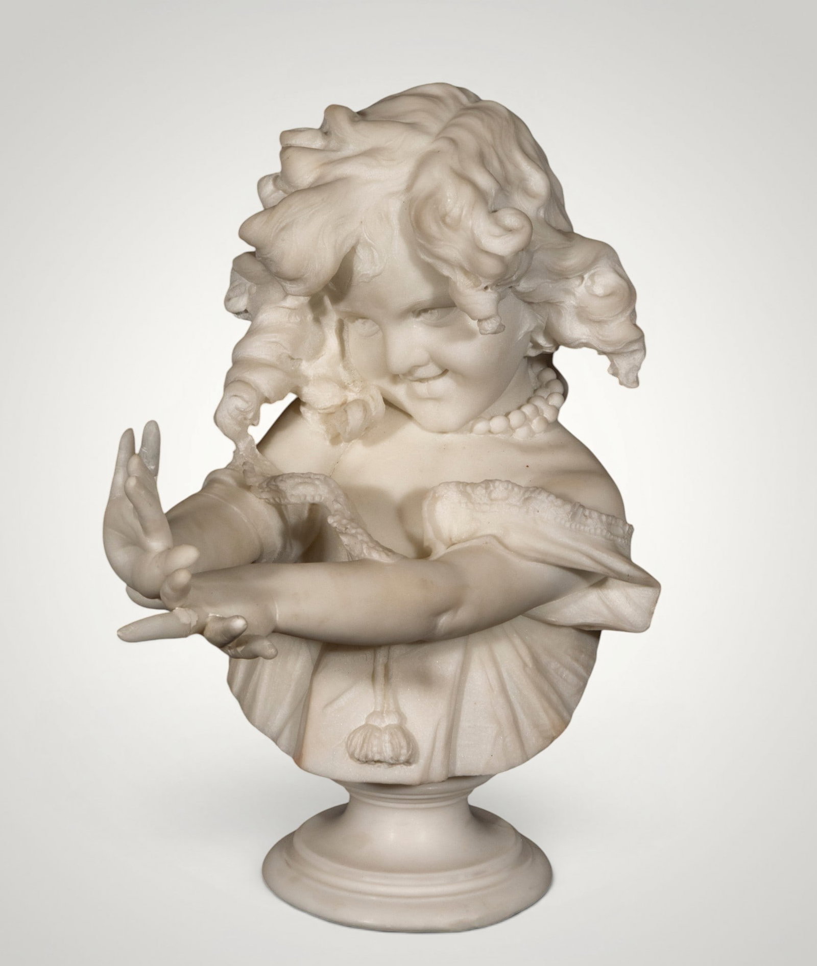 Marble bust of a young man with a bird. E. FIASCHI - European School. 19th century: Carved white marble. Finger in need of restoration. Measures 49 x 32 x 38 cm. Lively female bust with a beaded necklace and several birds intertwined in her hair and near her shoulder. The masterful c