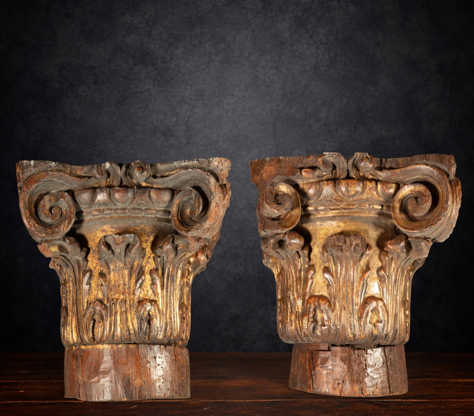 Exceptional pair of Renaissance capitals for table mounting, 16th-17th century: Spain or Italy, good condition of gilding, minor wear and losses consistent with age. Measures 36 cm high x 32 cm x 32 cm each.