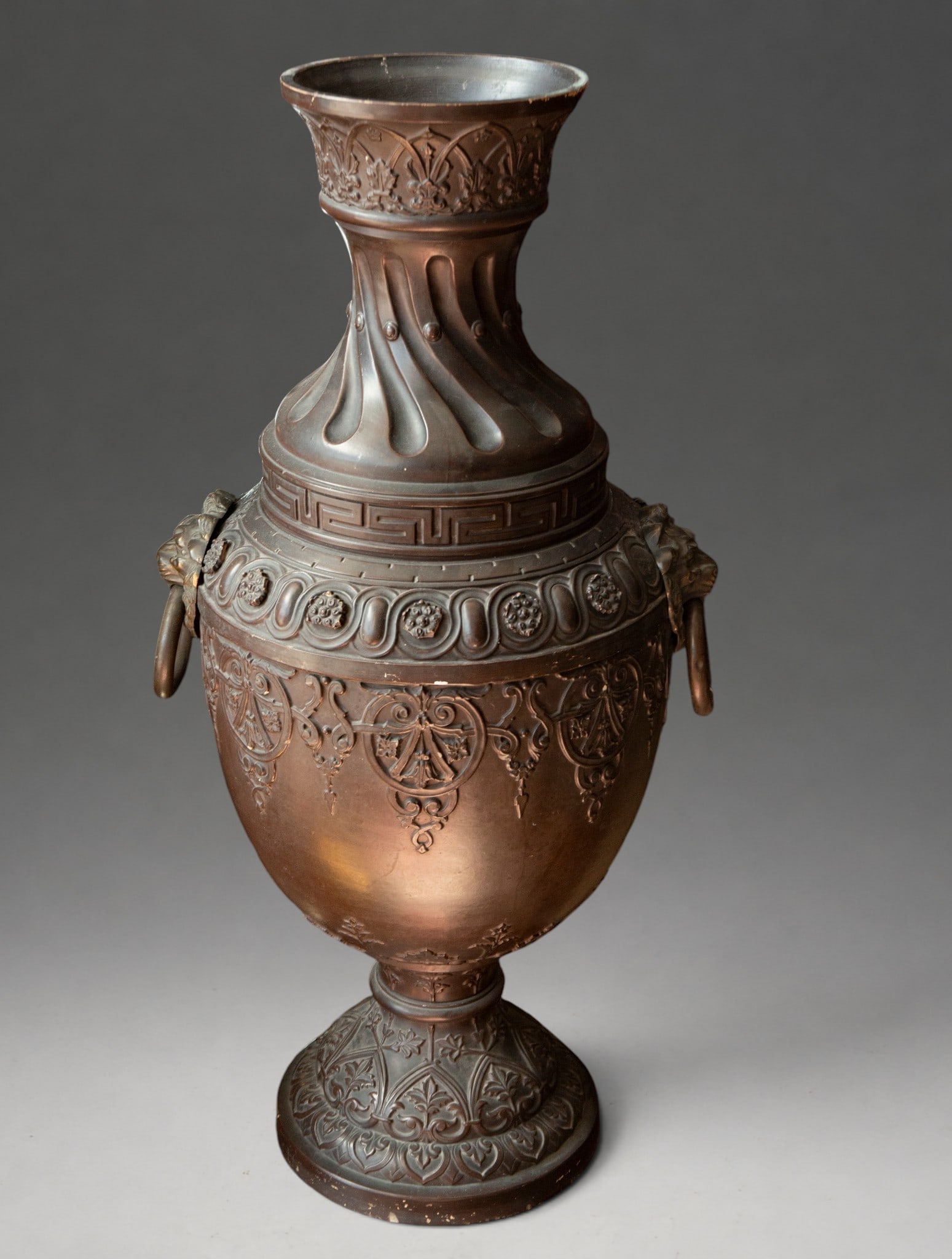 Historicist vase – Jerusalem – late 19th-early 20th century: Large ornamental vase with an ovoid body, tall neck, and circular foot, made, according to the information provided, of terracotta and bronze. It features historicist relief decoration arranged in reg