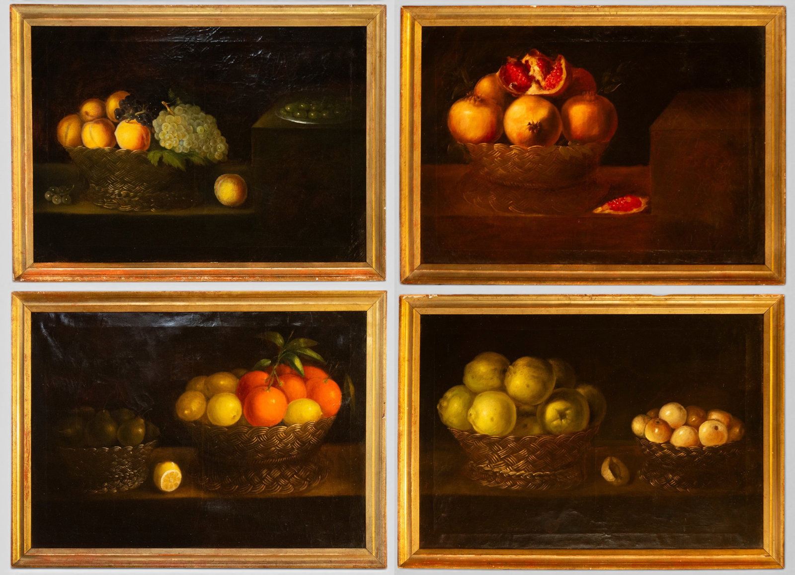 FOLLOWER OF LUIS MELÉNDEZ, 19TH CENTURY - Set of four still lifes of seasonal fruit - Spanish: Oil on canvas. A set of four still lifes depicting different compositions of fruit arranged in baskets on dark surfaces. They include grapes, peaches, pomegranates, citrus fruits, and other fruits, ar