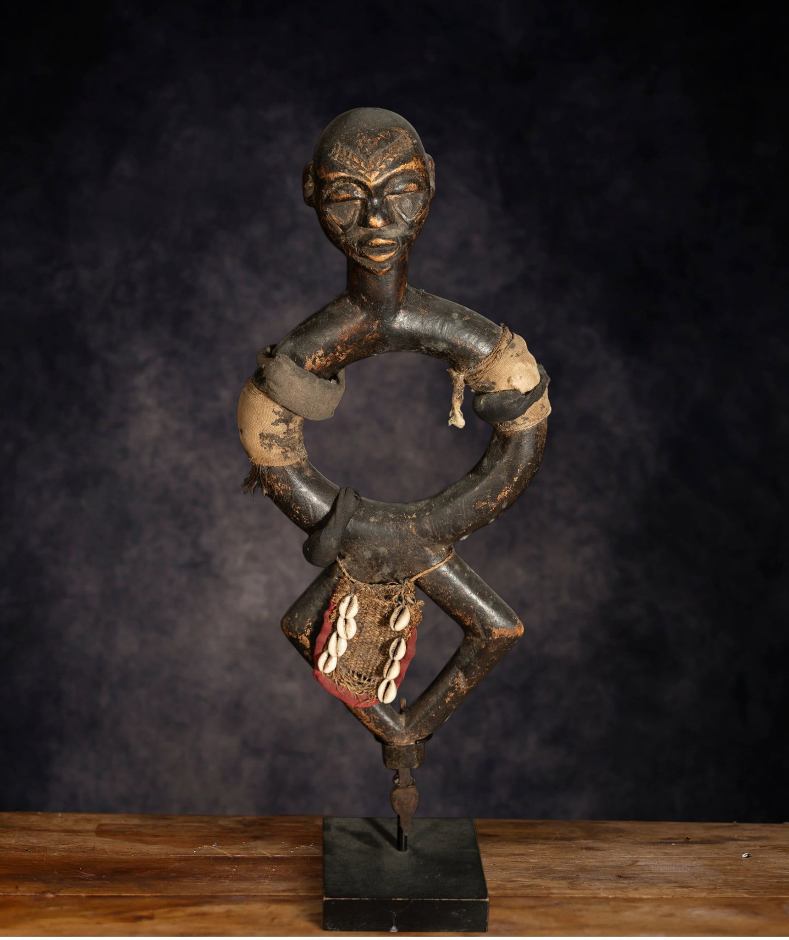 African Tribal Art - Central Africa - Congo, rare fertility wood, fabric and shells, around 1900: Cowries that were used as currency or as wedding and wealth ornaments: 59 X 22 CM
