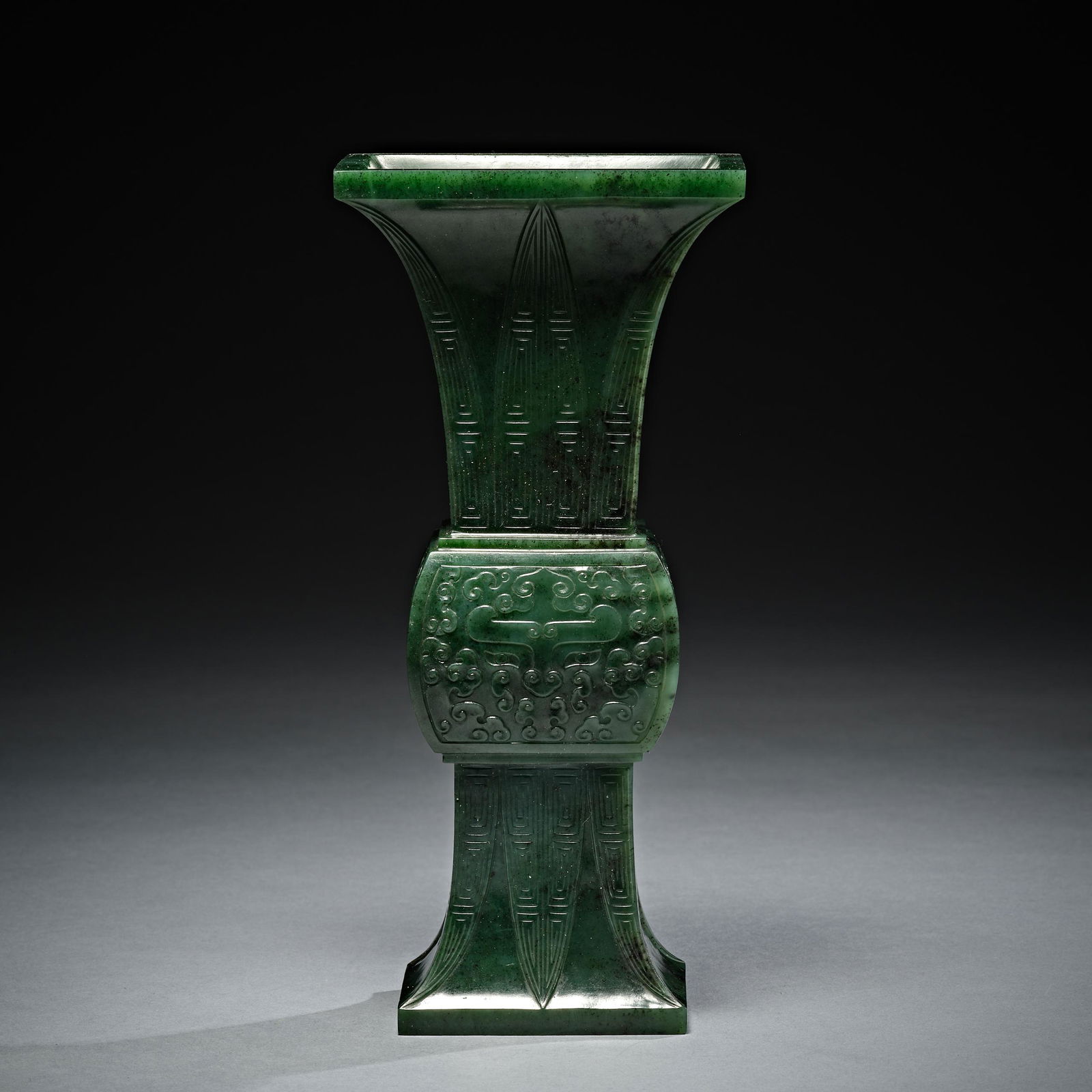 An archaic spinach-green jade ritual vessel (Gu) ,Qing dynasty (1 of 7)