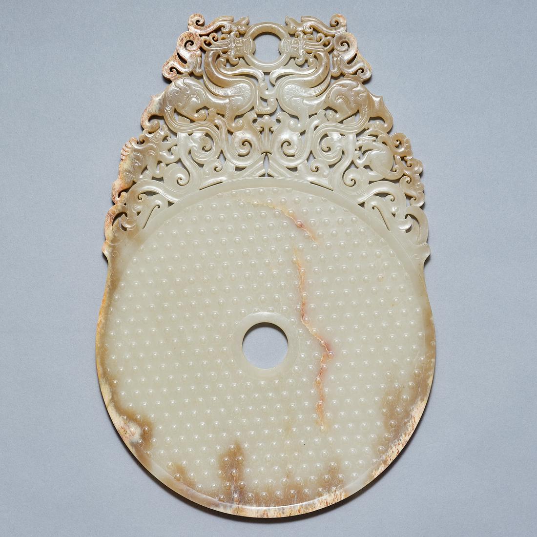 A large jade 'dragon' Bi disc, Warring States period (1 of 4)