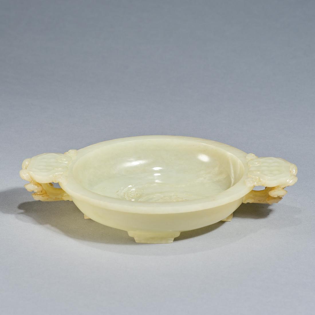 A carved jade 'Ruyi and floral' brush washer ,Qing dynasty (1 of 6)
