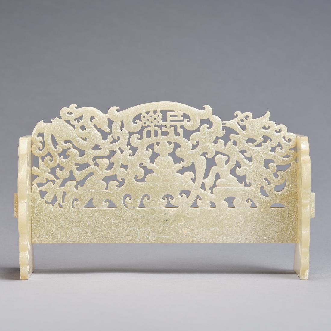 A calcified celadon jade 'mythical beasts and figural' plaque with jade supports ,Warring States (1 of 8)