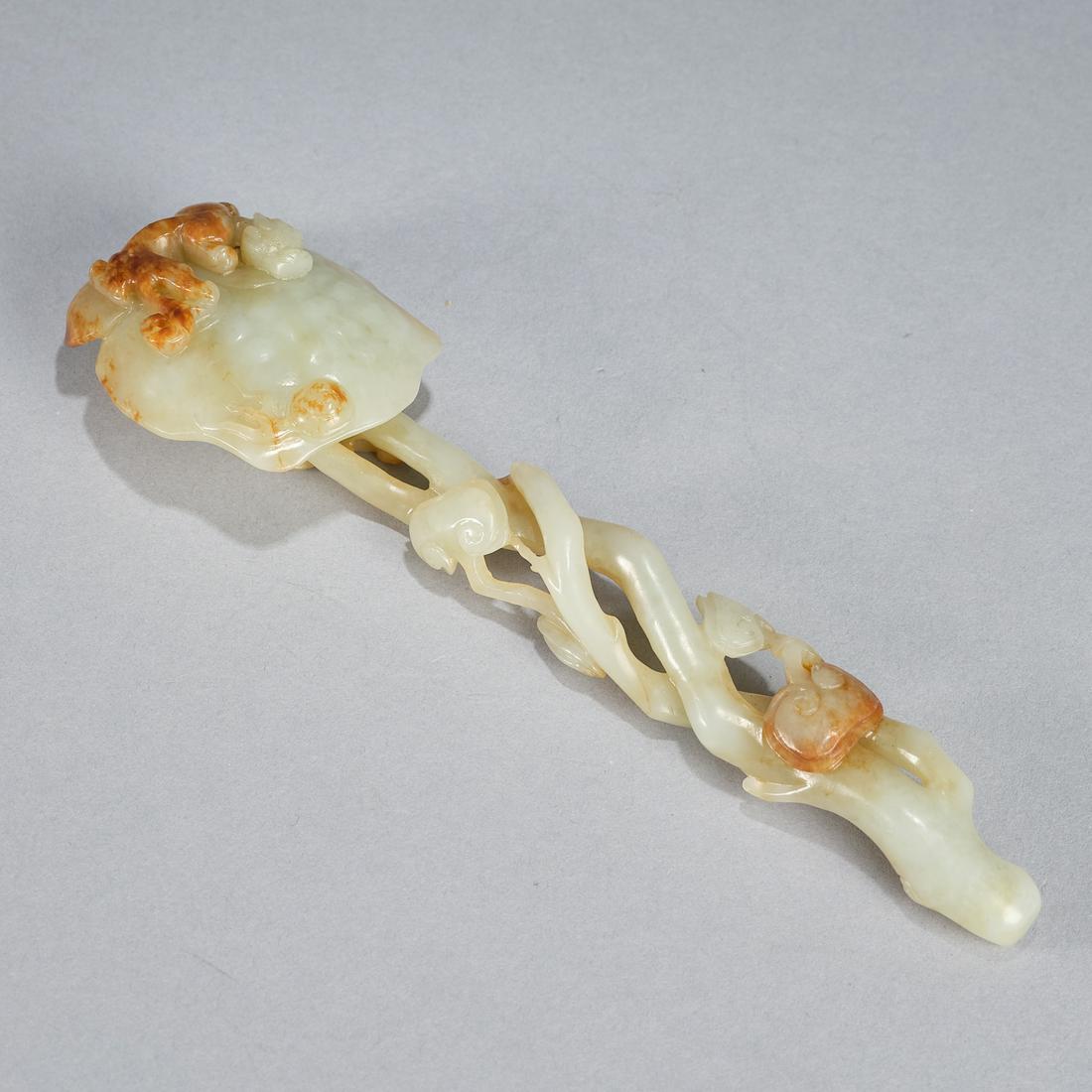 A carved jade 'chilong dragon and pomegranate' Ruyi sceptre ,Qing dynasty (1 of 5)