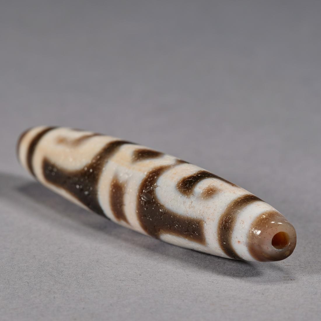 A Tibet dZi (Tianzhu bead),height 7.9cm,height 7.9cm,diameter 1.5cm (1 of 8)