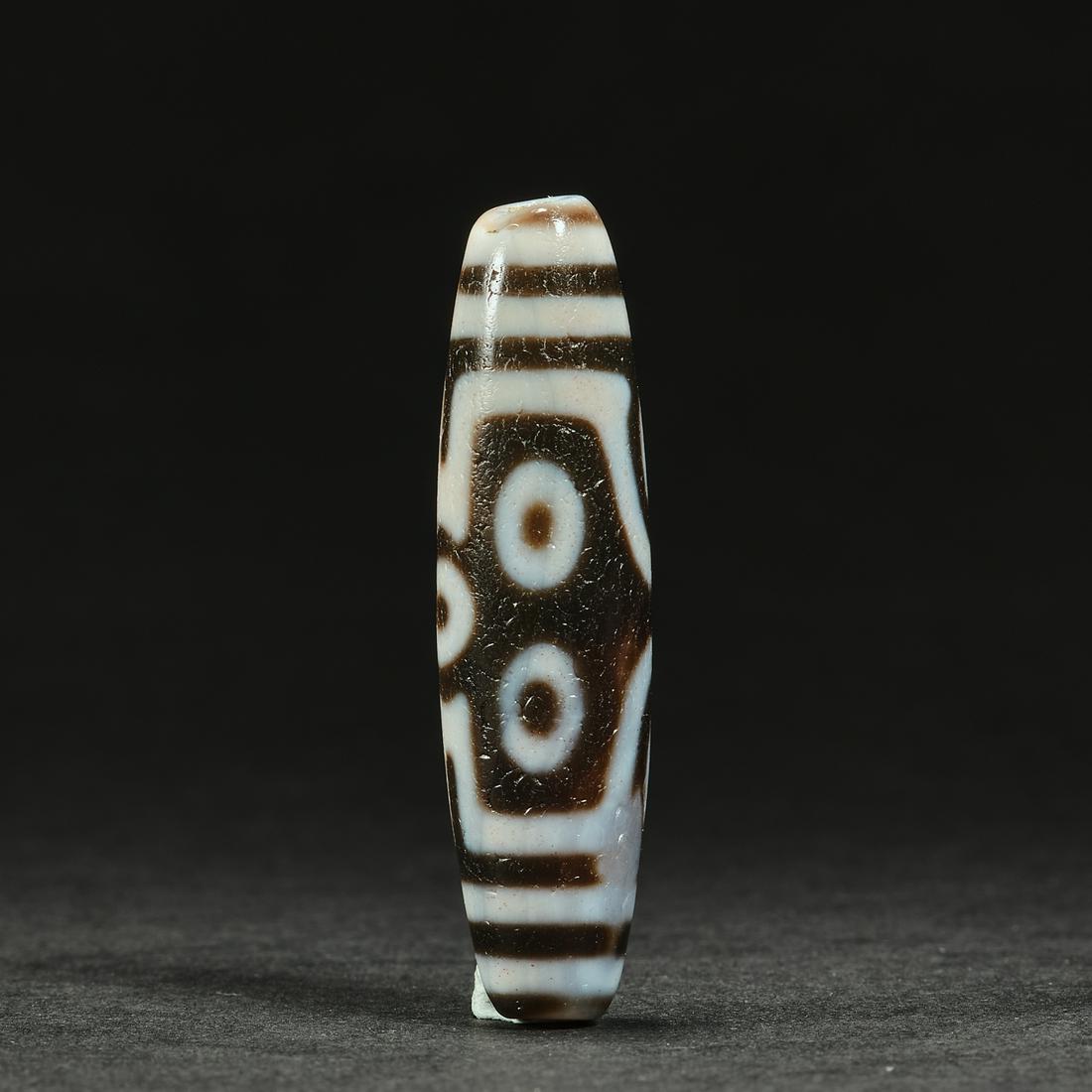 A Tibet dZi (Tianzhu bead),length 5.5cm,diameter 1.4cm (1 of 8)