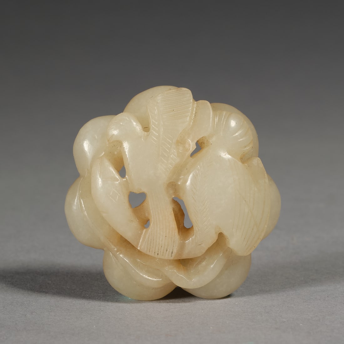 A small Chinese Hetian jade 'bird and floral' pendant,Qing dynasty (1 of 5)