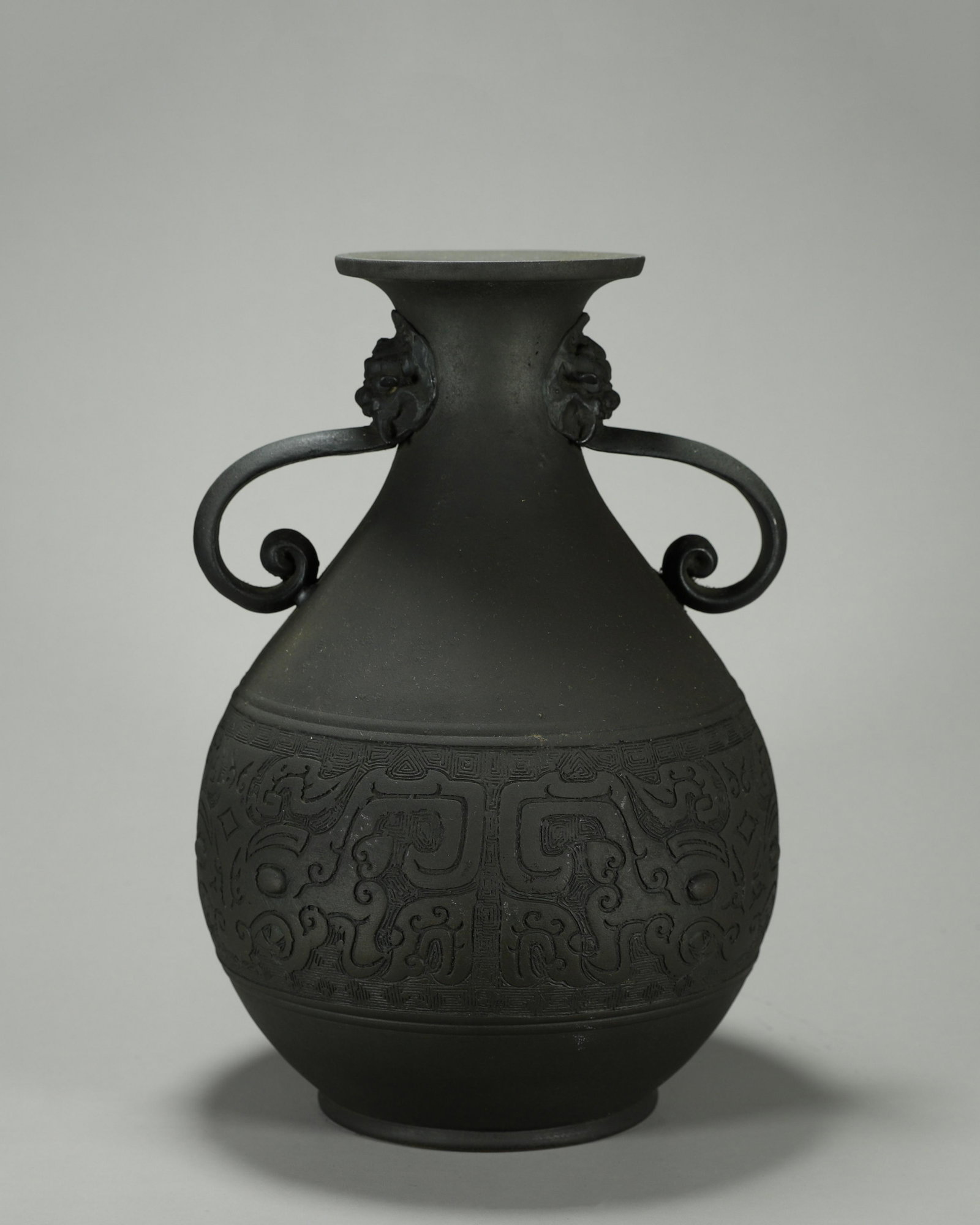 A taotie patterned copper vase with beast shaped ears (1 of 11)