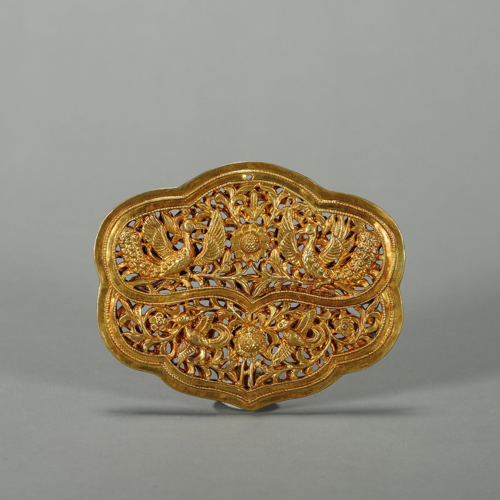 A hollowed out phoenix bird gold pendant (1 of 7)