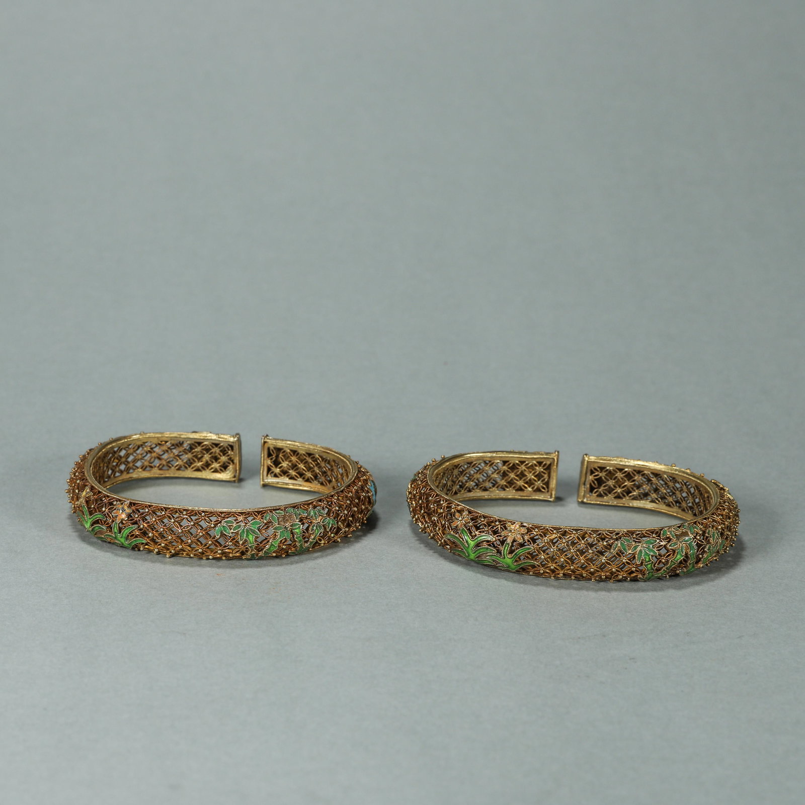 A pair of bamboo and orchid patterned gilding silver bracelets (1 of 9)